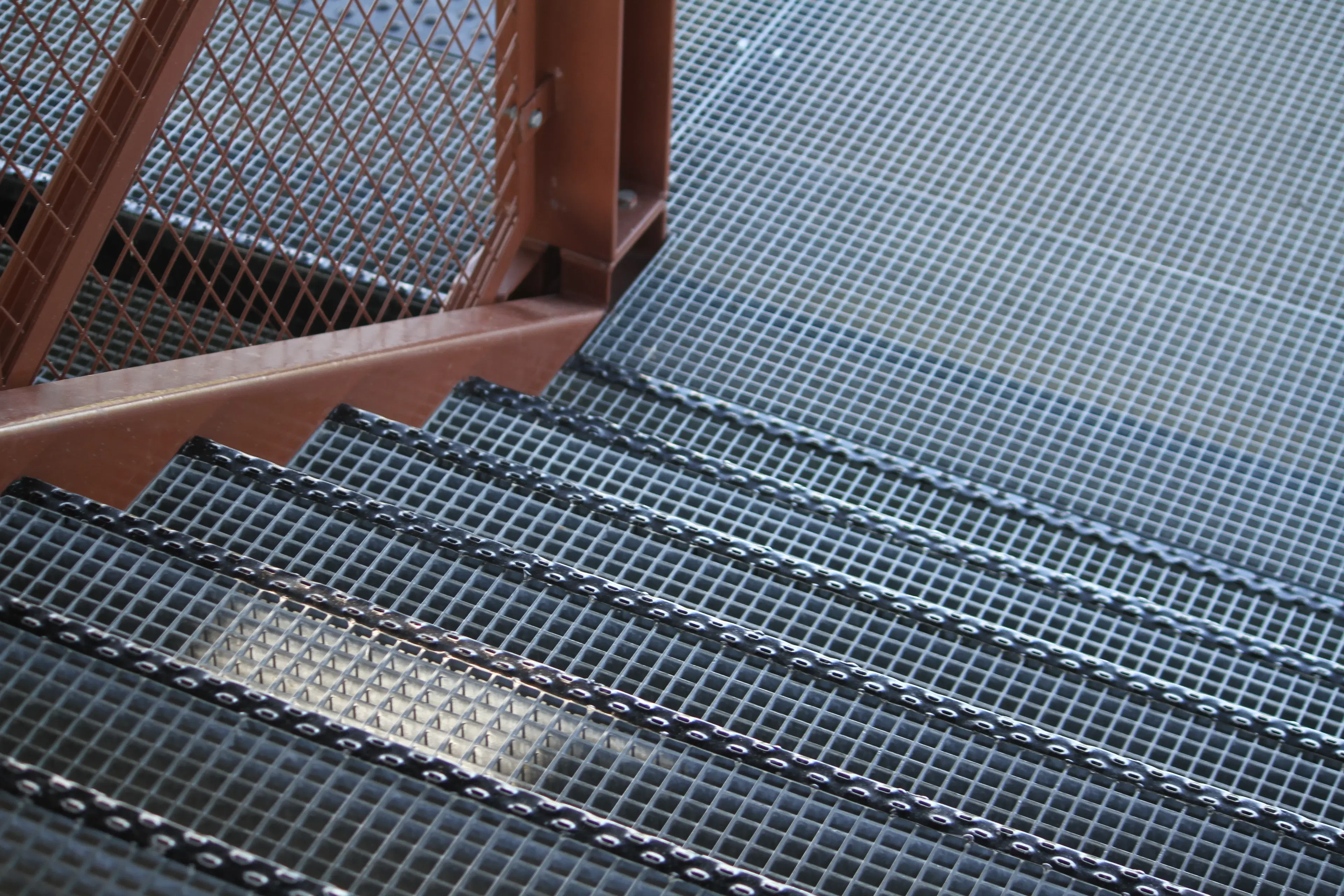 Industrial steel grating stair treads with antiskid nosing